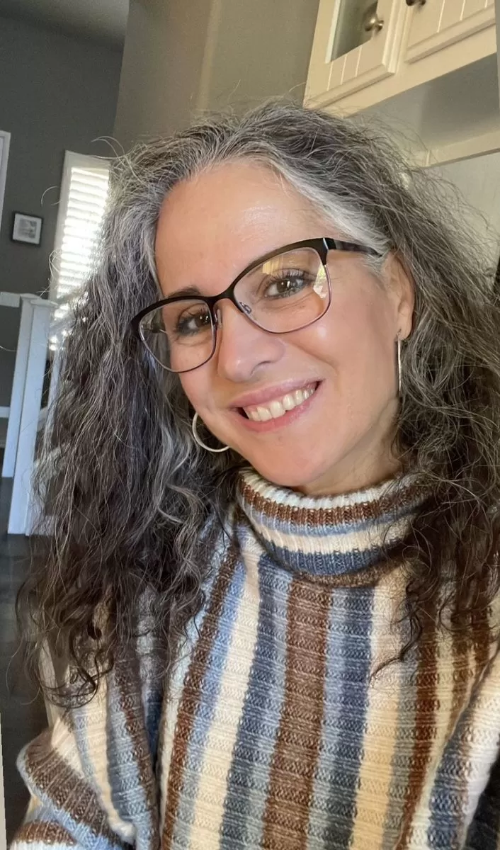 Luciane M.